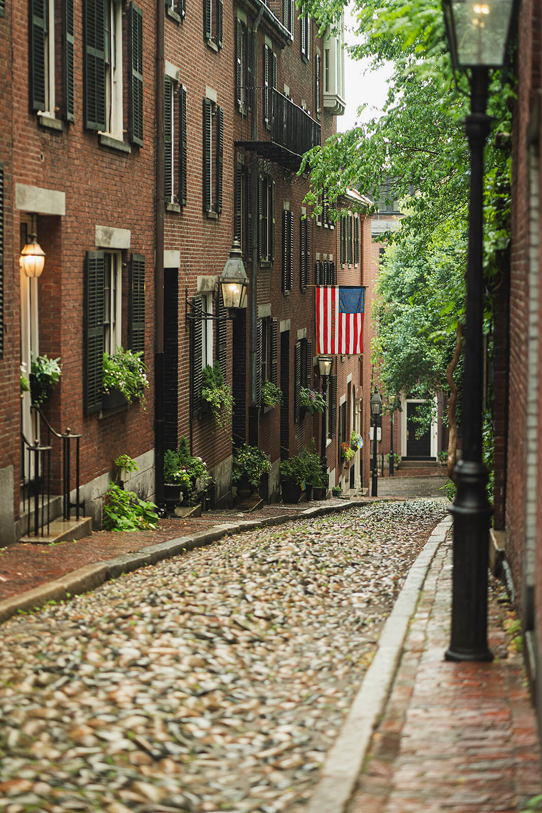 Looking down a cobbled street in Boston