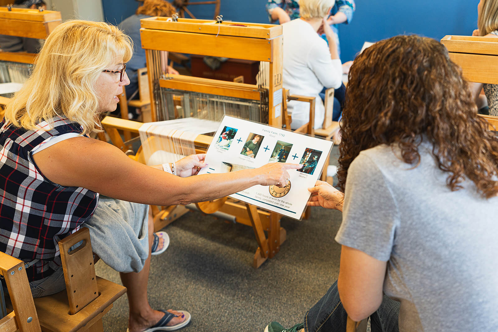 Two women looking at instructions