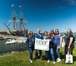 People standing near a ship
